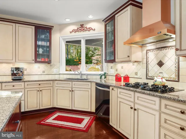 a living room with furniture cabinets and a book shelf