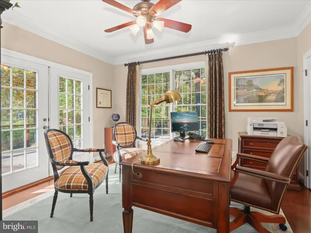 a spacious bedroom with a bed and a fireplace