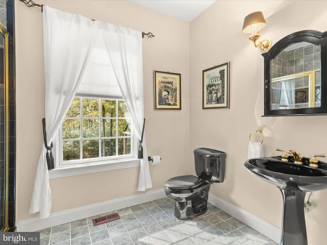 a view of balcony with deck and wooden floor