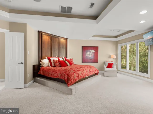 a backyard of a house with outdoor seating