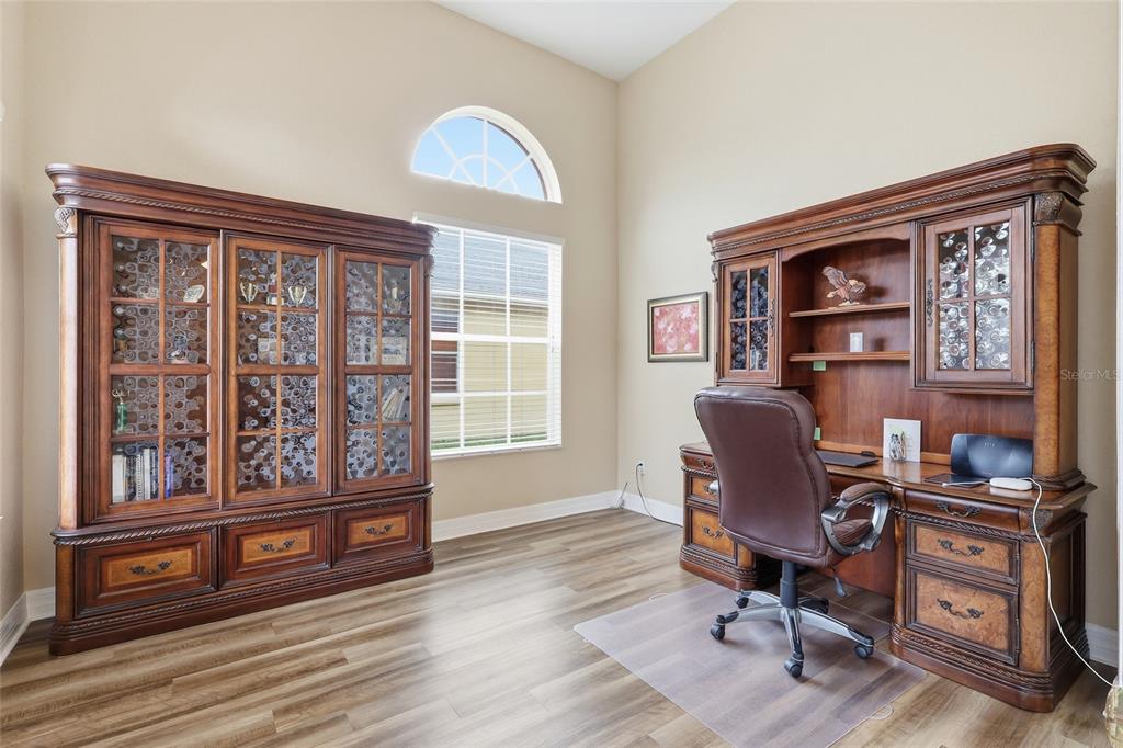 11749 Newberry Grove Loop Riverview, FL 33579 - Photo 19 of 54 a view of a workspace with furniture and a window