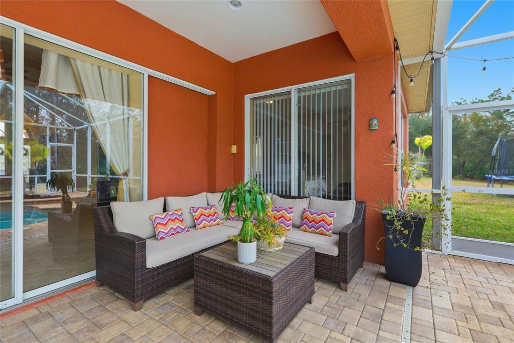 11749 Newberry Grove Loop Riverview, FL 33579 - Photo 37 of 54 a building outdoor space with patio furniture