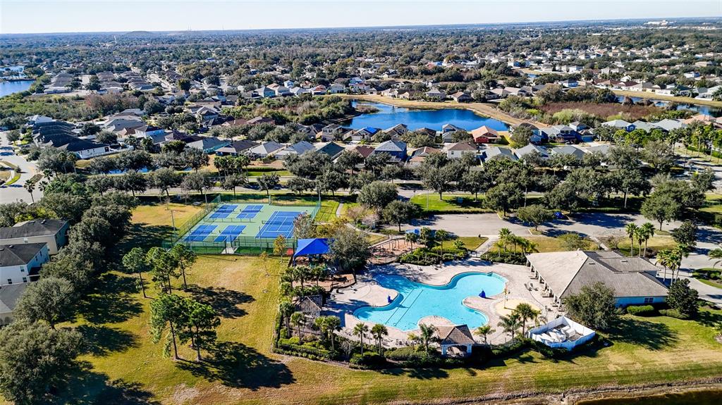 11749 Newberry Grove Loop Riverview, FL 33579 - Photo 43 of 54 an aerial view of residential houses with outdoor space