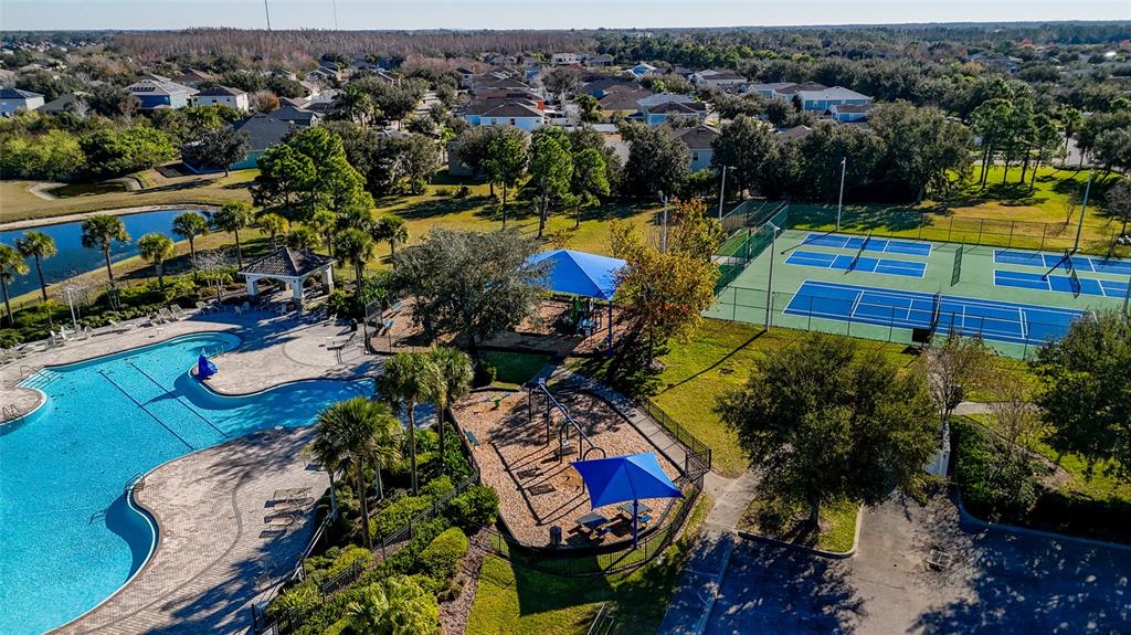 11749 Newberry Grove Loop Riverview, FL 33579 - Photo 51 of 54 an aerial view of a house with a swimming pool yard and outdoor seating