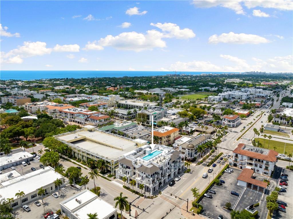 875 6th Avenue South, Unit 304 Naples, FL 34102 - Photo 33 of 40 an aerial view of residential houses with city view