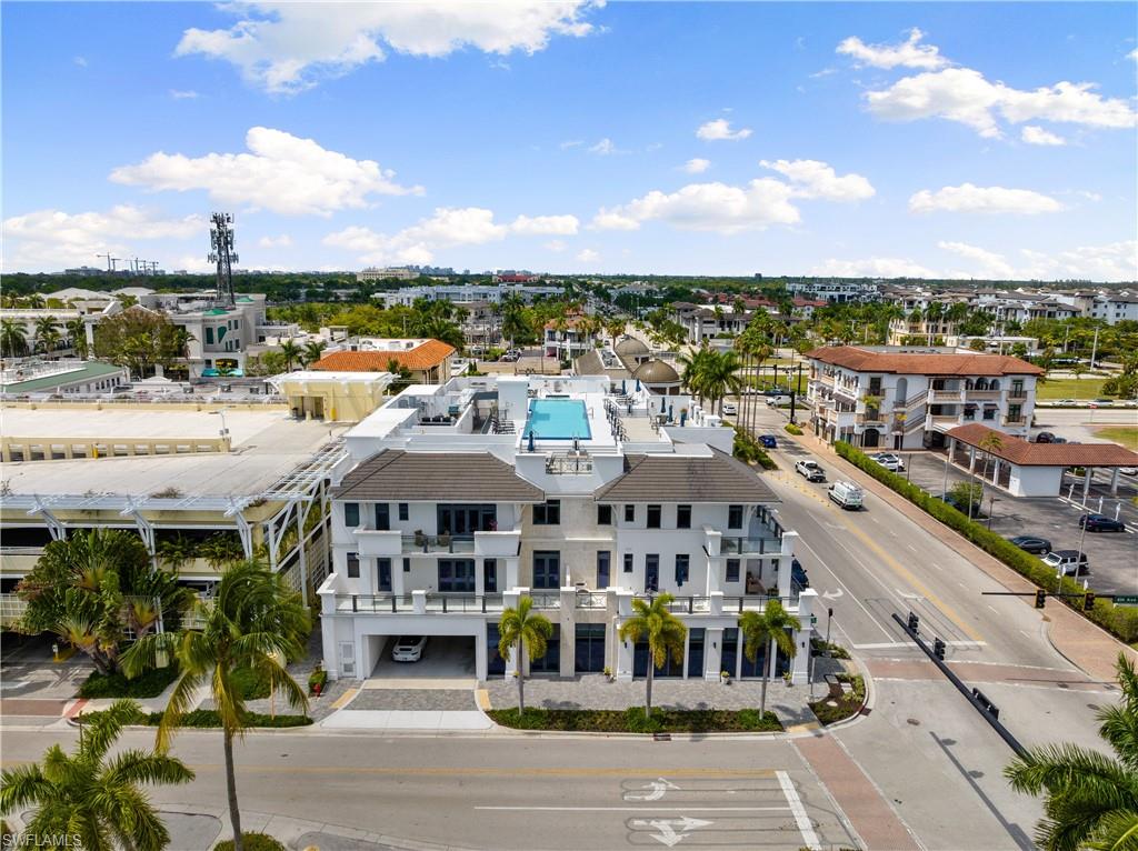 875 6th Avenue South, Unit 304 Naples, FL 34102 - Photo 34 of 40 a view of city with balcony