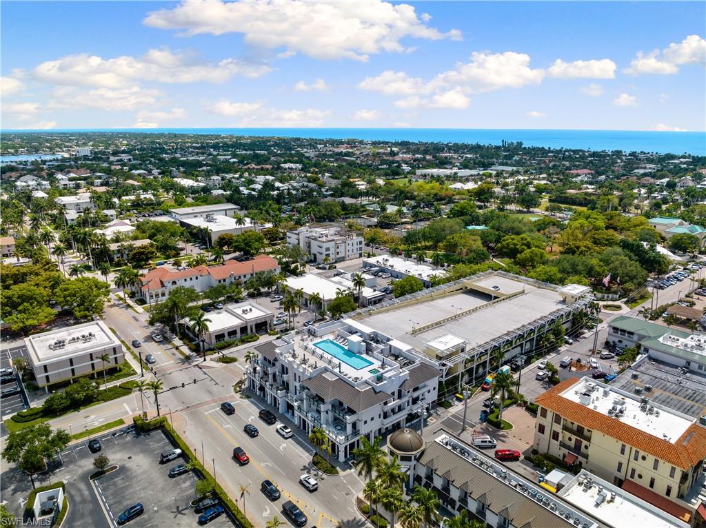 875 6th Avenue South, Unit 304 Naples, FL 34102 - Photo 35 of 40 an aerial view of a city