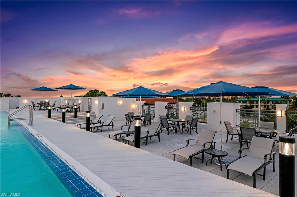 875 6th Avenue South, Unit 304 Naples, FL 34102 - Photo 36 of 40 a view of a patio with swimming pool