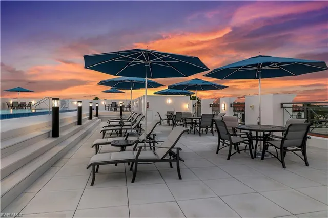 a view of empty room with a fireplace