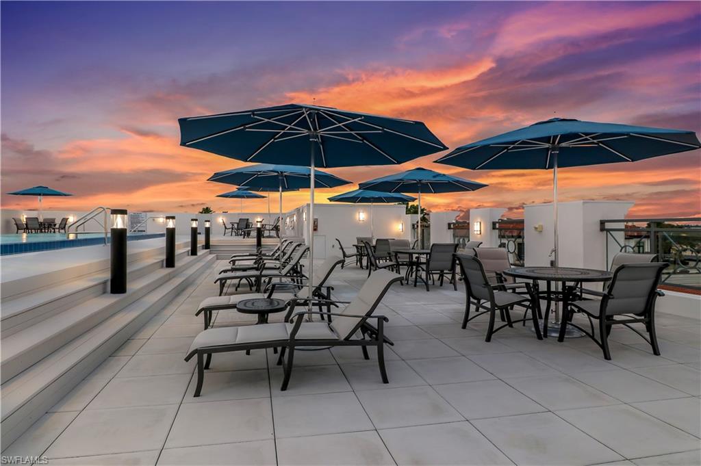 875 6th Avenue South, Unit 304 Naples, FL 34102 - Photo 37 of 40 an outdoor space with seating