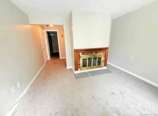 a view of a livingroom with a fireplace