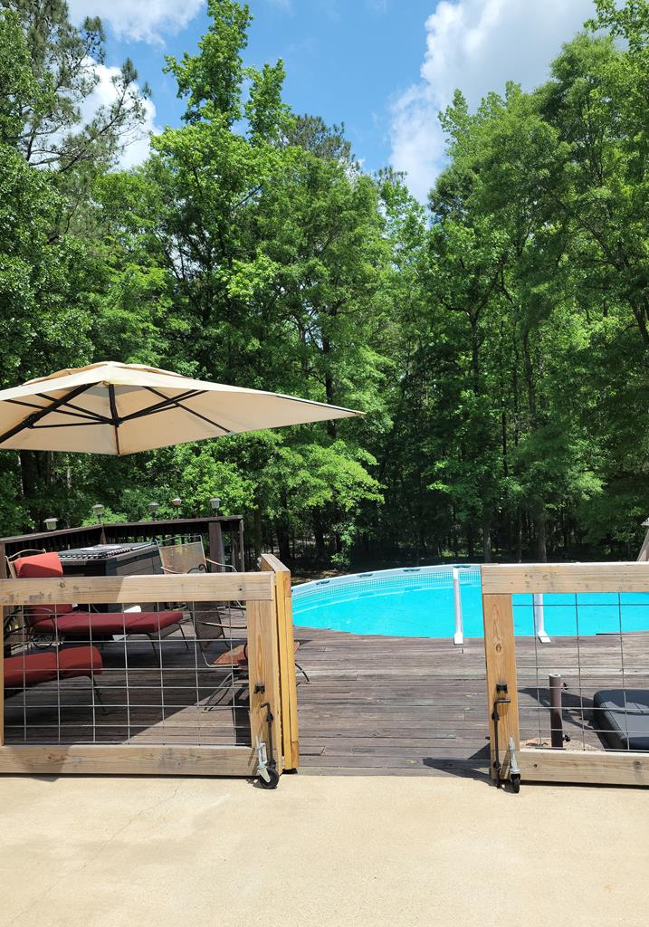 3755 Almond Road Fortson, GA 31808 - Photo 28 of 36 Pool view w/ Gate Open