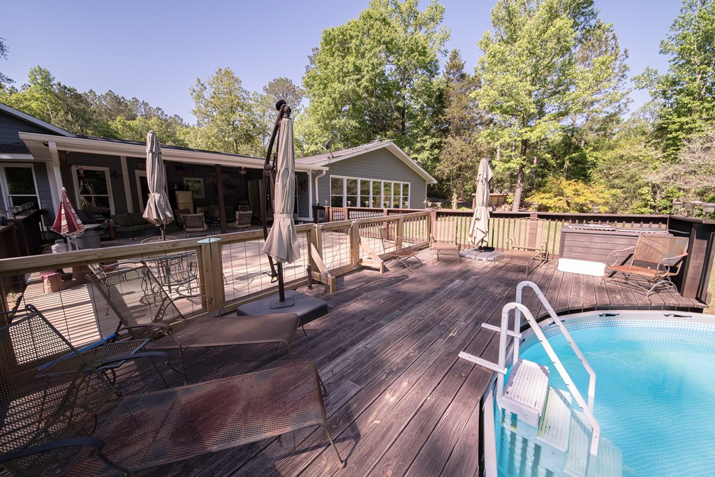 3755 Almond Road Fortson, GA 31808 - Photo 29 of 36 Deck around Pool