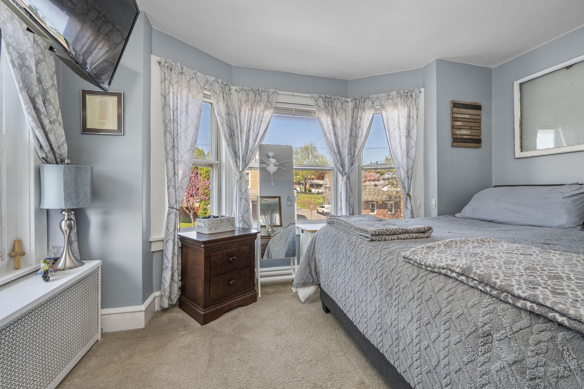 2116 Noble Street Reading, PA 19609 - Photo 16 of 35 Serene Primary Bedroom with bright views.