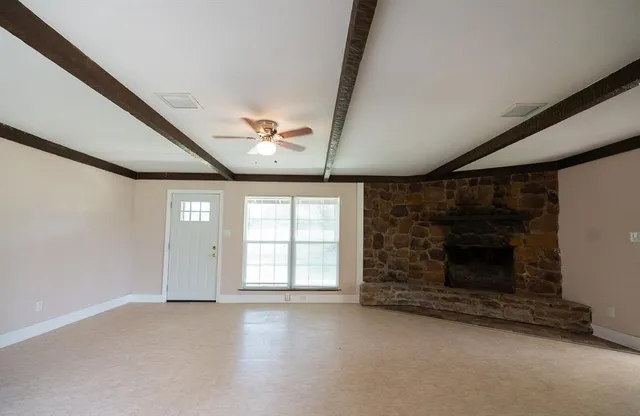 an empty room with windows