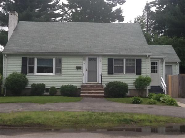 19 Barrows Road Reading, MA 01867 - Photo 1 of 21 a front view of a house with a yard