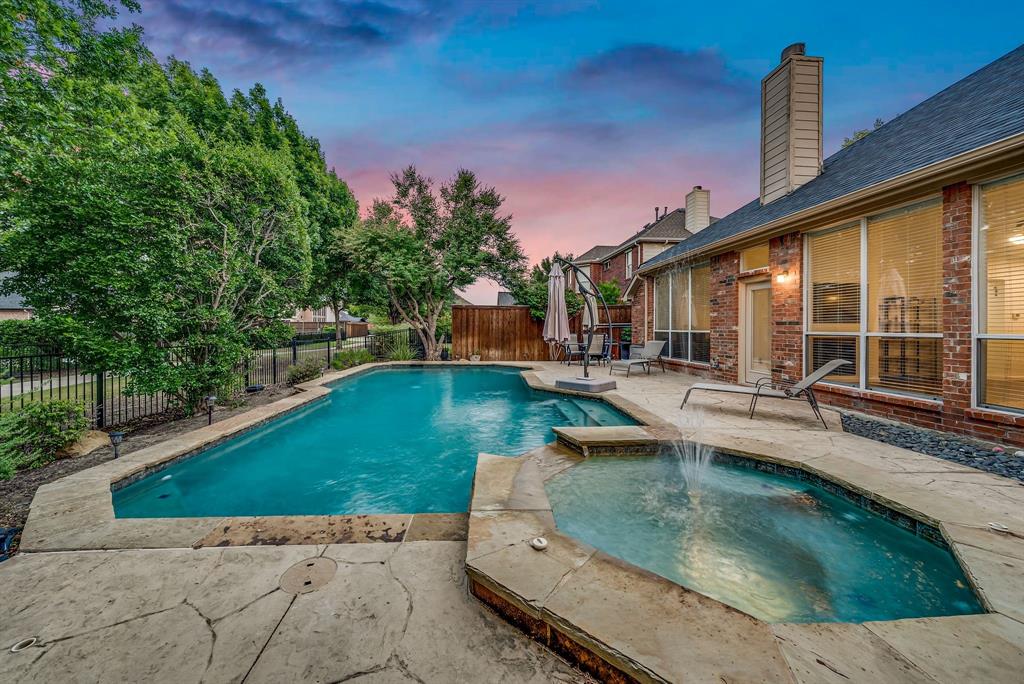 2524 Windgate Drive Frisco, TX 75033 - Photo 1 of 38 swimming pool view with a outdoor seating