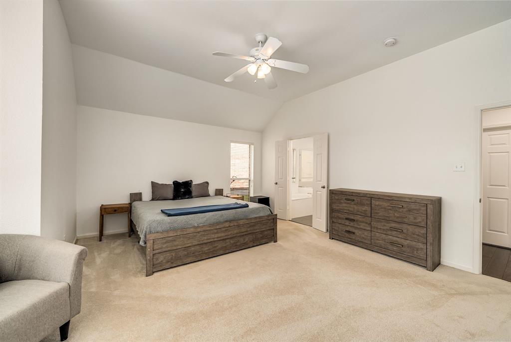 2524 Windgate Drive Frisco, TX 75033 - Photo 16 of 38 a living room with furniture and a ceiling fan