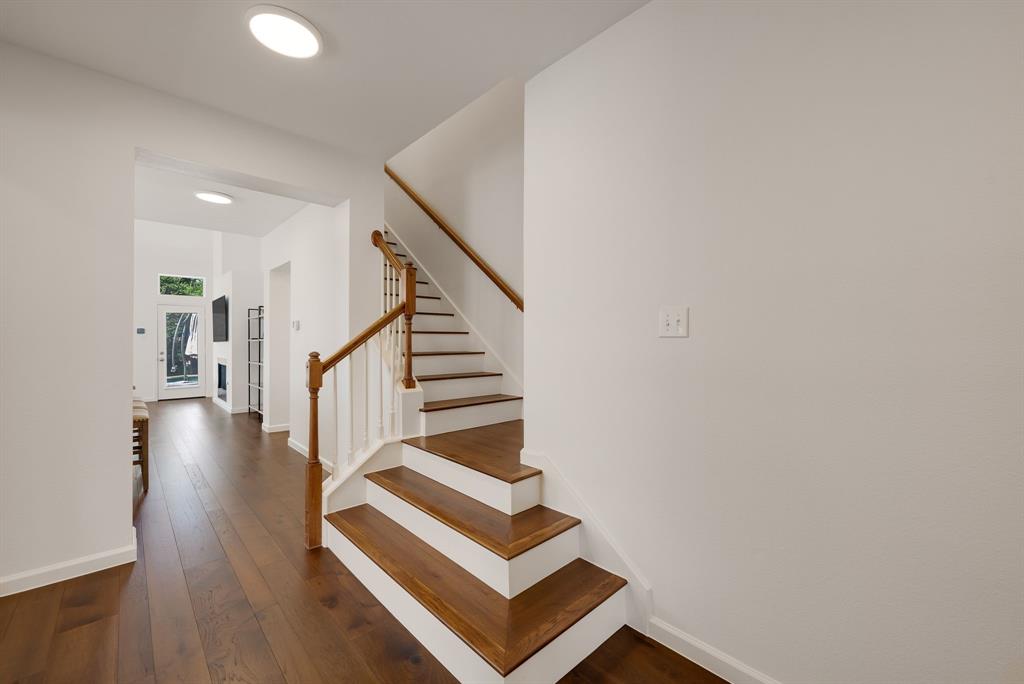 2524 Windgate Drive Frisco, TX 75033 - Photo 19 of 38 a view of entryway and hall with wooden floor