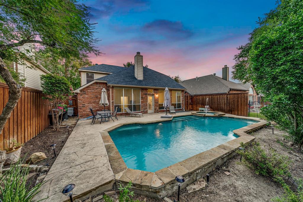 2524 Windgate Drive Frisco, TX 75033 - Photo 27 of 38 a front view of a house with swimming pool yard