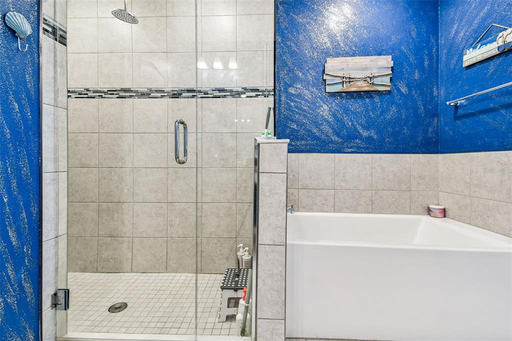 8207 Abalone Loop Palmetto, FL 34221 - Photo 15 of 37 a bathroom with a shower and a sink