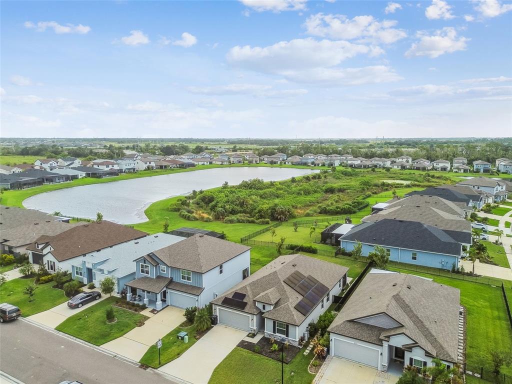 8207 Abalone Loop Palmetto, FL 34221 - Photo 35 of 37 an aerial view of a house with garden space and outdoor space