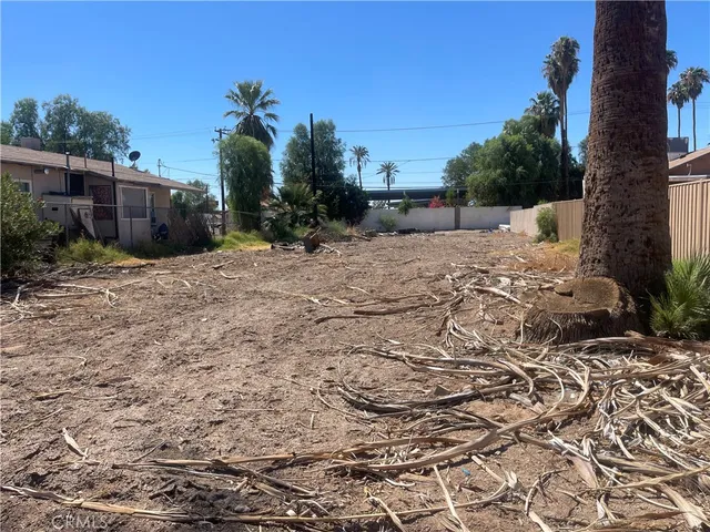 a view of a backyard of the house