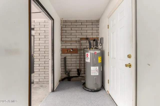 a view of house with backyard and trees