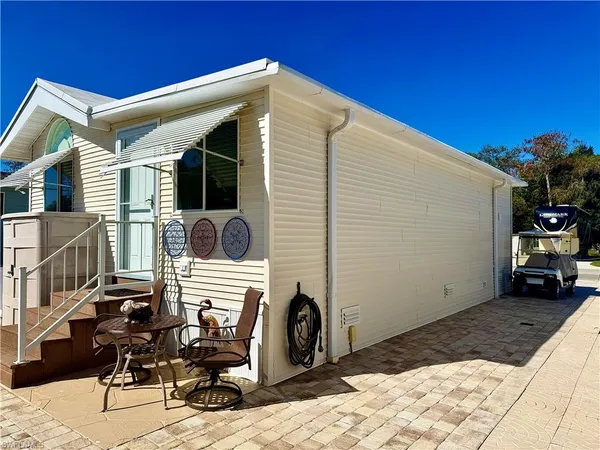 a front view of a house with a patio