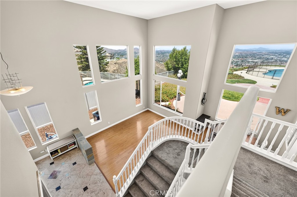 16318 Sun Summit Drive Riverside, CA 92503 - Photo 9 of 47 Formal dining room from up stairs with view 16318 sun summit drive, riverside, california 92503