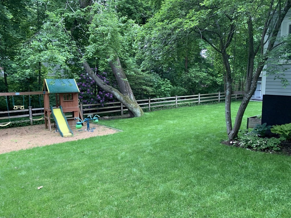 27 Brookfield Road Wellesley, MA 02481 - Photo 30 of 33 a view of a backyard with swings