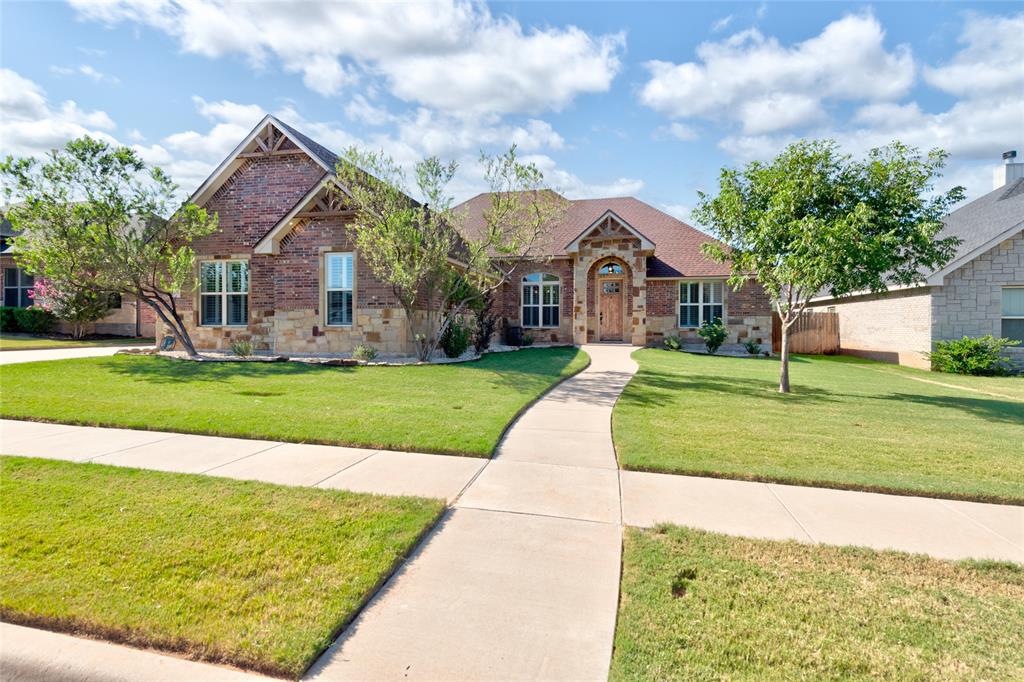 Brick and stone exterior with arched entryway