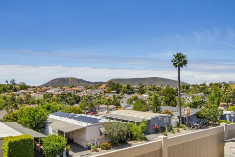 a view of a city with a building in the background