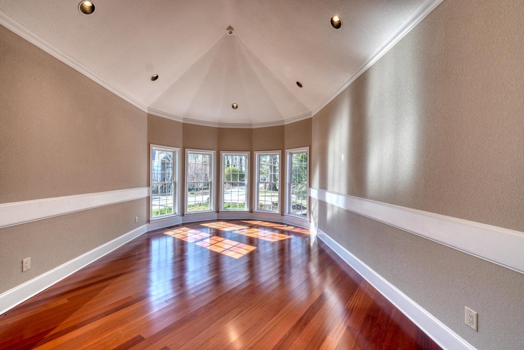1436 Harris Ridge Road Young Harris, GA 30582 - Photo 11 of 86 a view of an empty room with wooden floor and a window