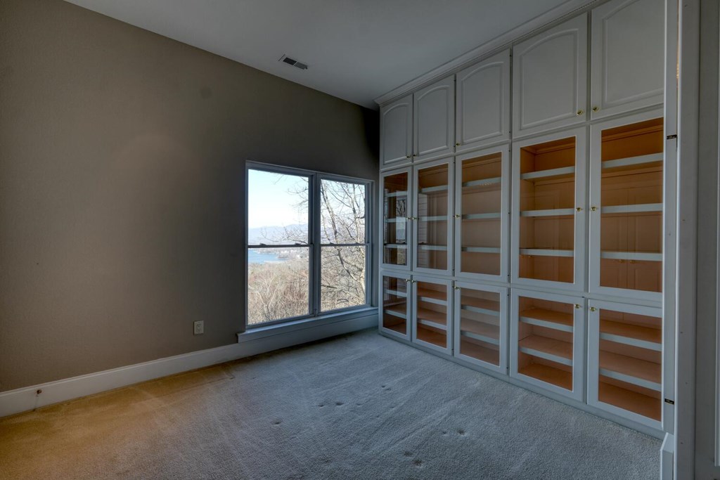 1436 Harris Ridge Road Young Harris, GA 30582 - Photo 28 of 86 a view of an empty room with a window