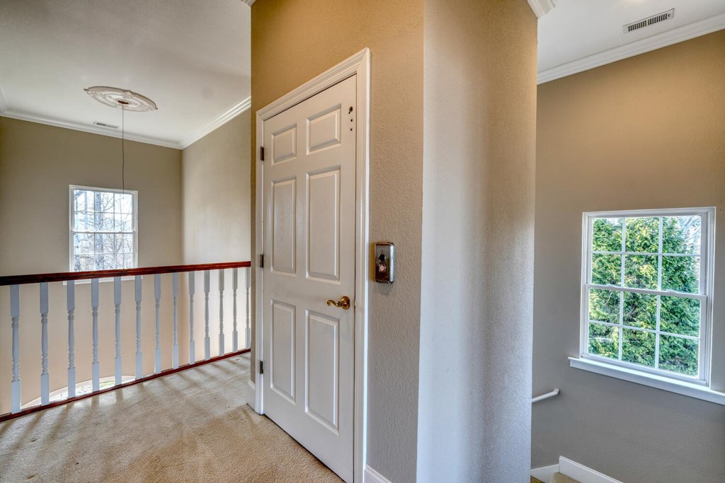 1436 Harris Ridge Road Young Harris, GA 30582 - Photo 31 of 86 a view of a hallway with windows
