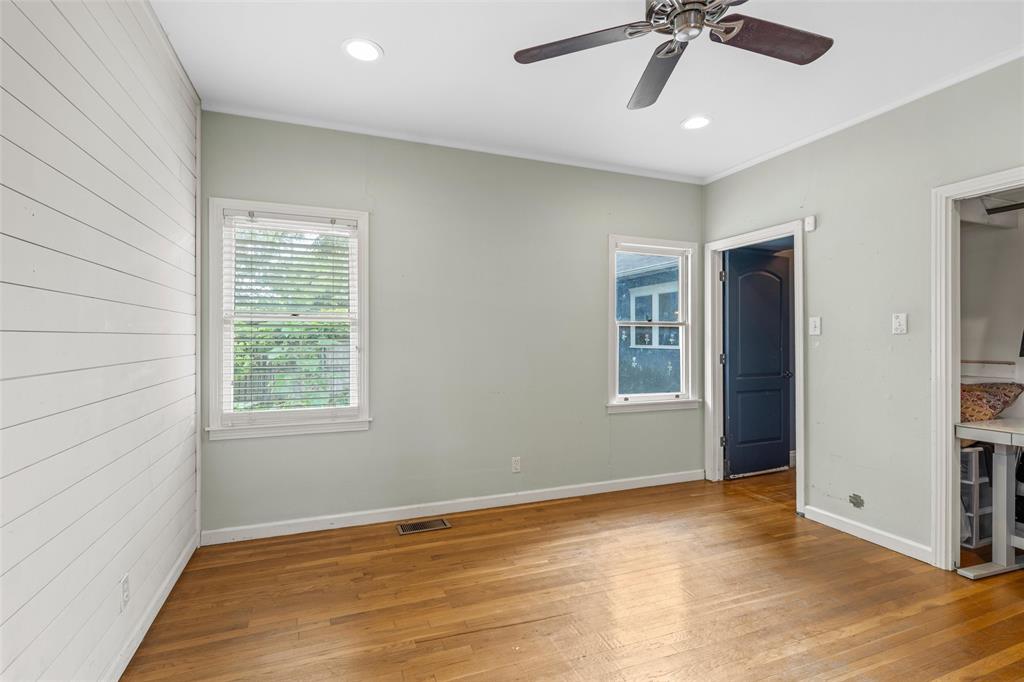 2717 Colcord Avenue Waco, TX 76707 - Photo 13 of 34 a view of empty room with wooden floor and fan
