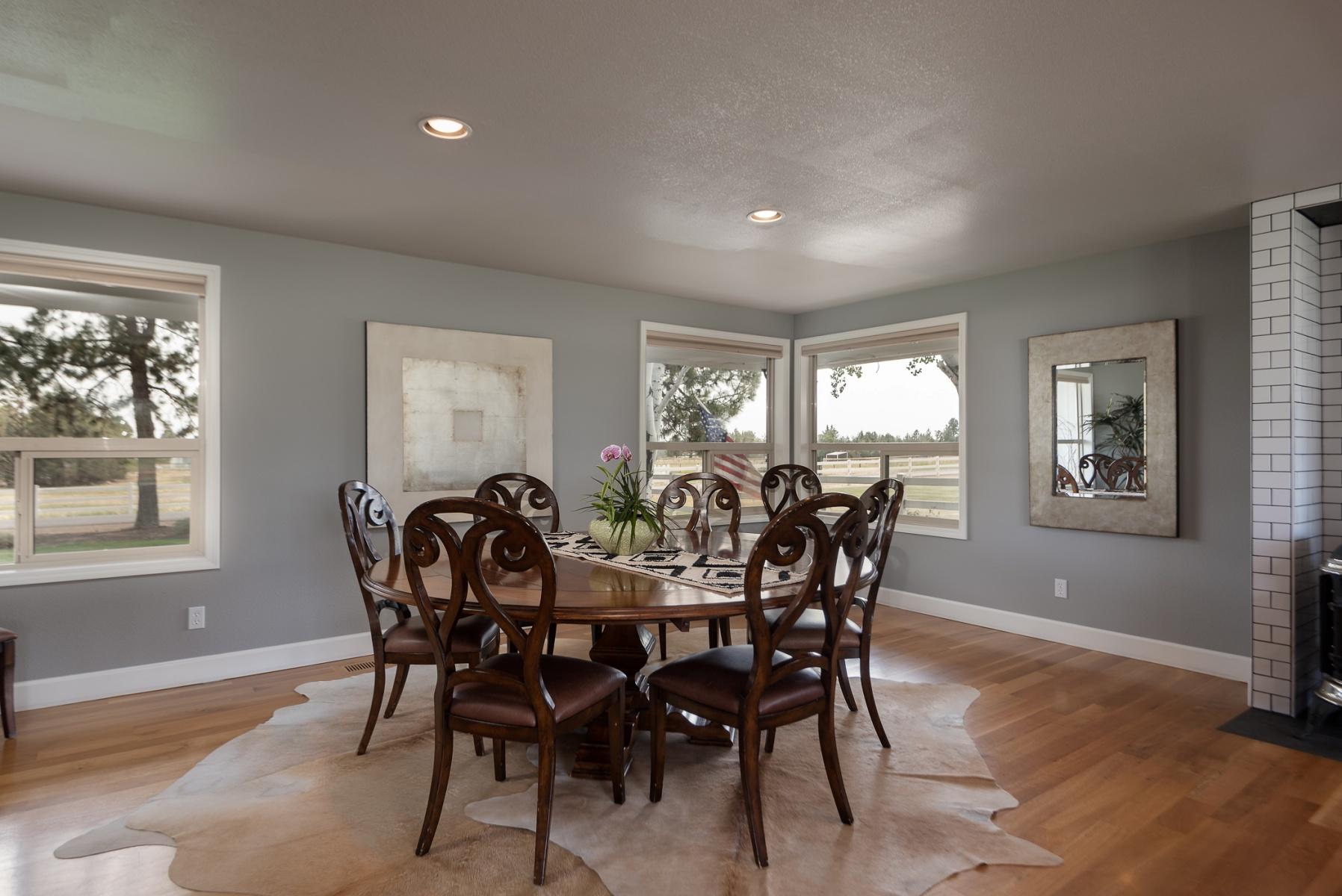 64495 Research Road Bend, OR 97703 - Photo 21 of 54 a view of a dining room with furniture and window