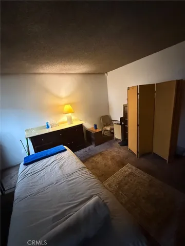 a bathroom with a toilet and a tub