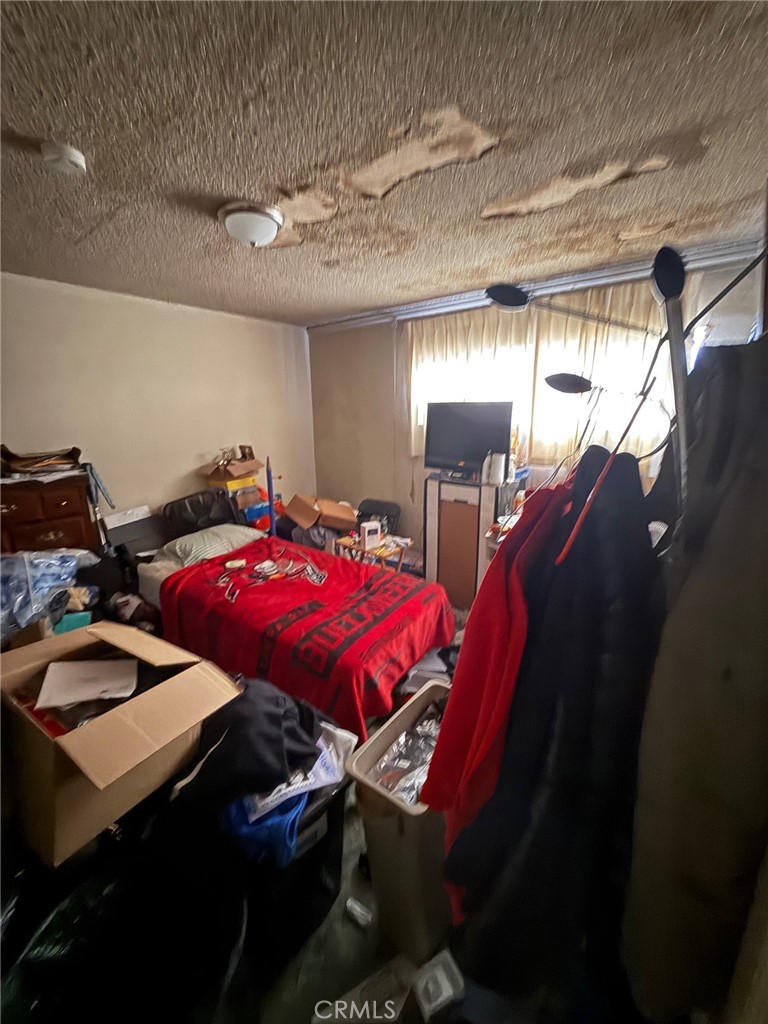 471 West Bennett Street Compton, CA 90220 - Photo 15 of 20 a view of a room with gym equipment