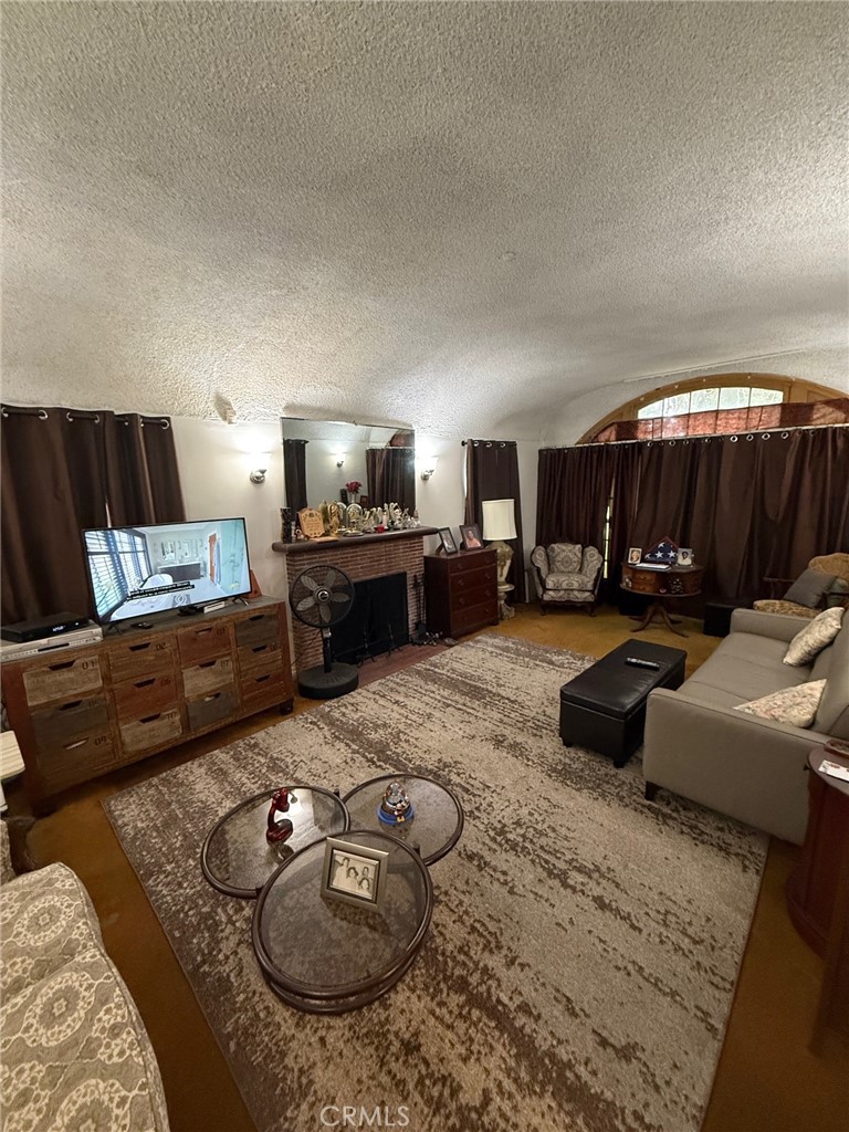 471 West Bennett Street Compton, CA 90220 - Photo 3 of 20 a living room with furniture and a couch