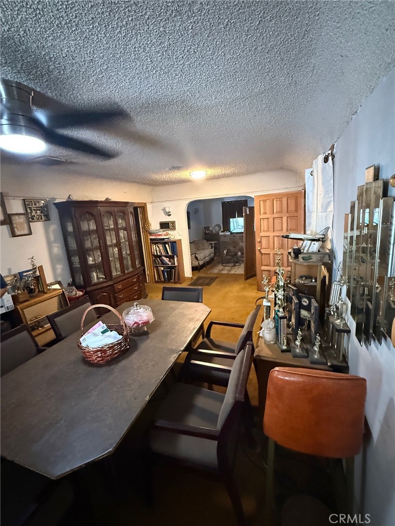 471 West Bennett Street Compton, CA 90220 - Photo 10 of 20 a room with furniture and a flat screen tv