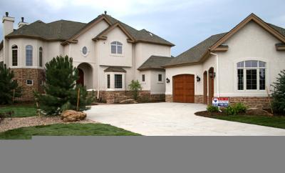 1287 Buffalo Ridge Road Castle Rock, CO 80108 - Photo 1 of 1 a front view of a house with a yard and garage