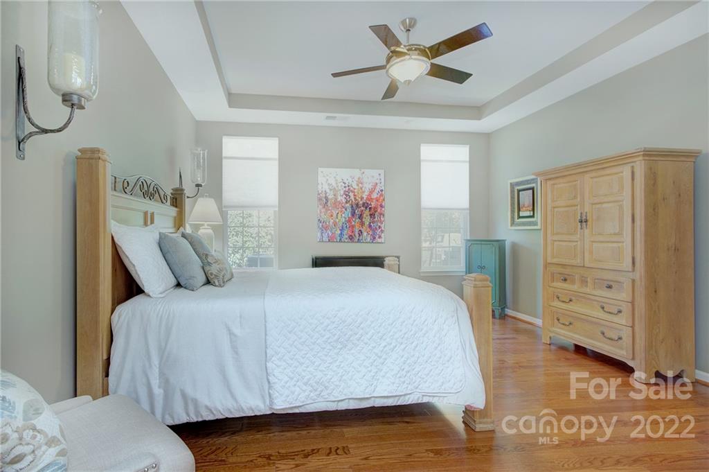 256 Garnet Court Fort Mill, SC 29708 - Photo 17 of 34 a bedroom with a bed a dresser and book shelf