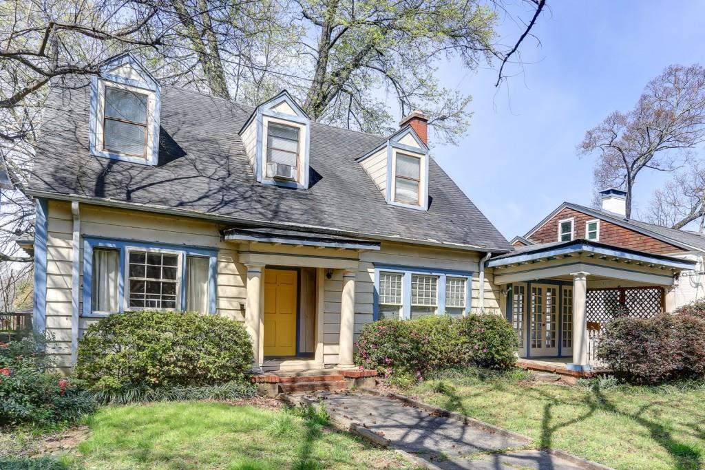 898 Rosedale Road Northeast Atlanta, GA 30306 - Photo 1 of 1 a front view of a house with garden