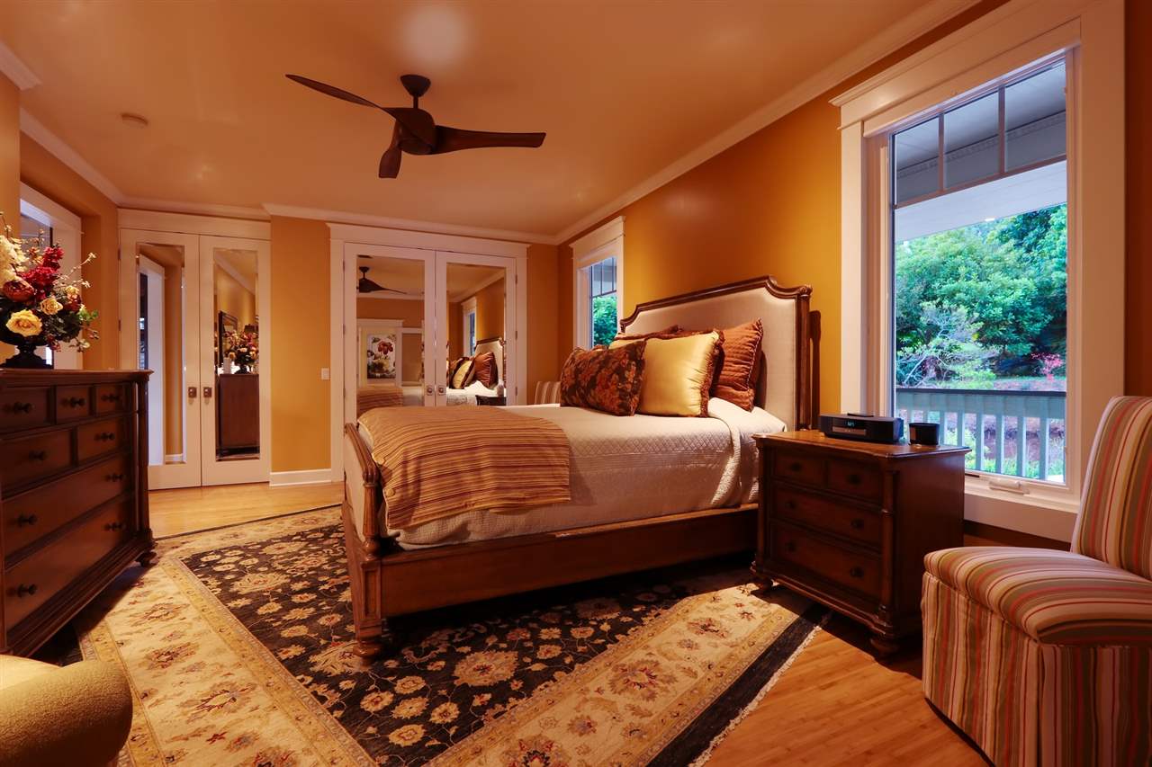 1268 Lower Kimo Drive Kula, HI 96790 - Photo 11 of 30 a bedroom with a bed window and couch