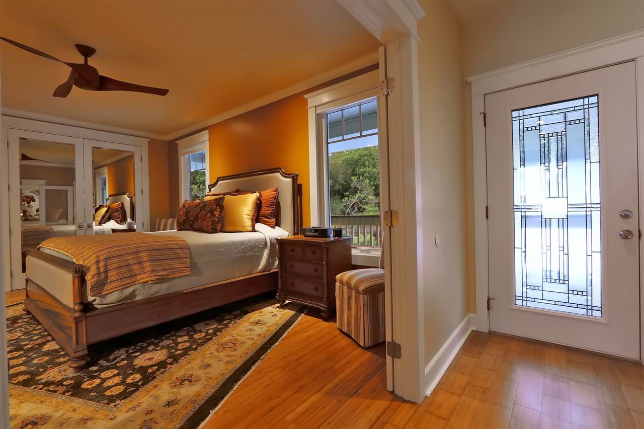 1268 Lower Kimo Drive Kula, HI 96790 - Photo 12 of 30 a bedroom with a bed closet and a window