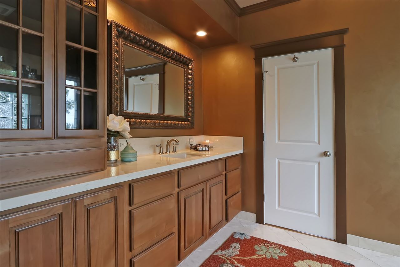 1268 Lower Kimo Drive Kula, HI 96790 - Photo 15 of 30 a bathroom with a sink and a mirror