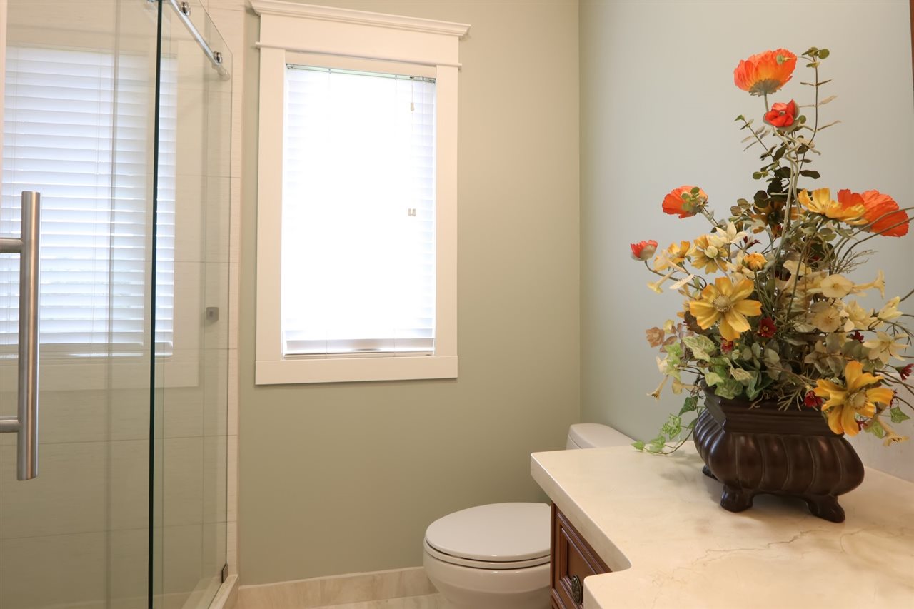 1268 Lower Kimo Drive Kula, HI 96790 - Photo 21 of 30 a bathroom with a sink toilet and vanity