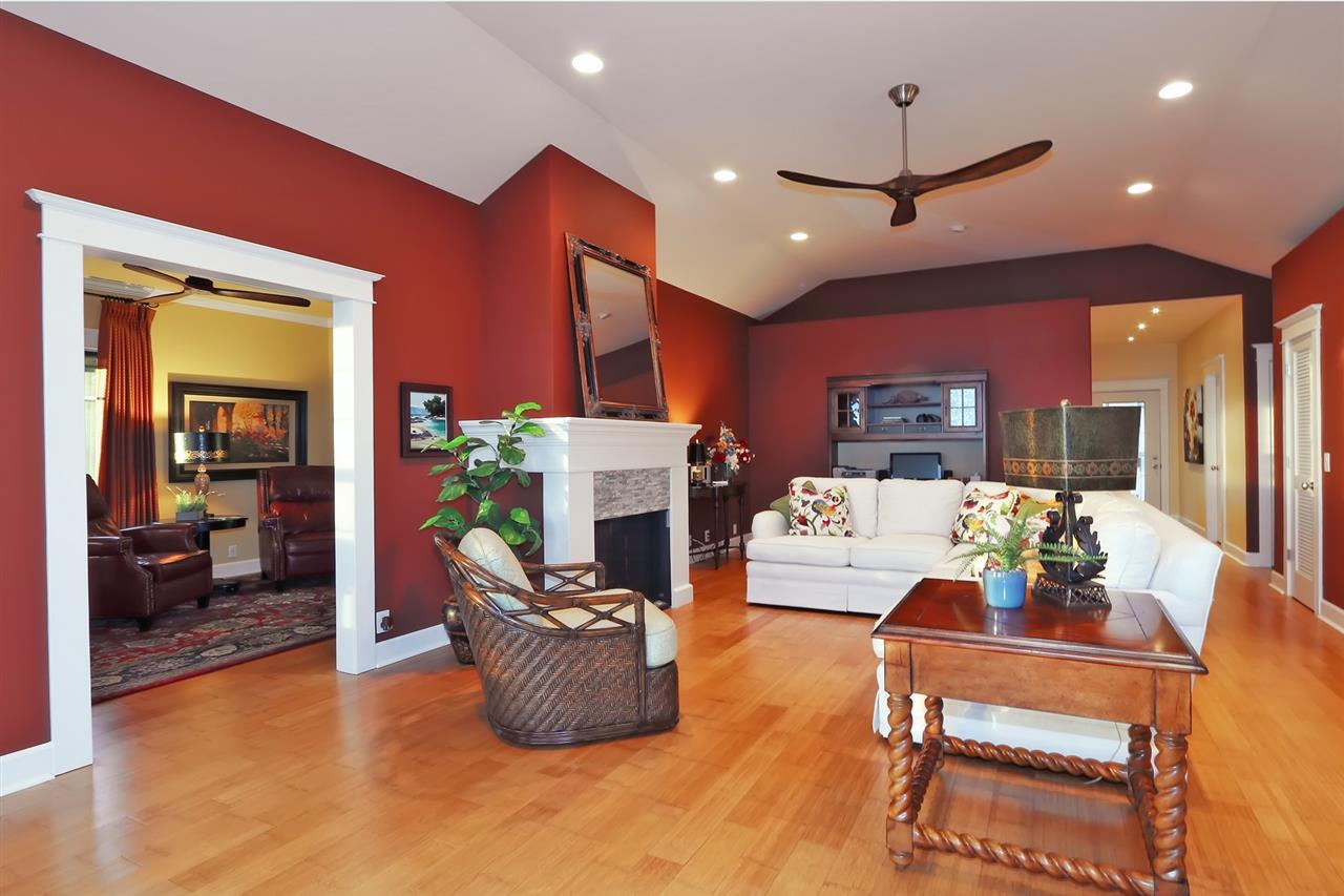 1268 Lower Kimo Drive Kula, HI 96790 - Photo 9 of 30 a dining room with furniture a fireplace and wooden floor